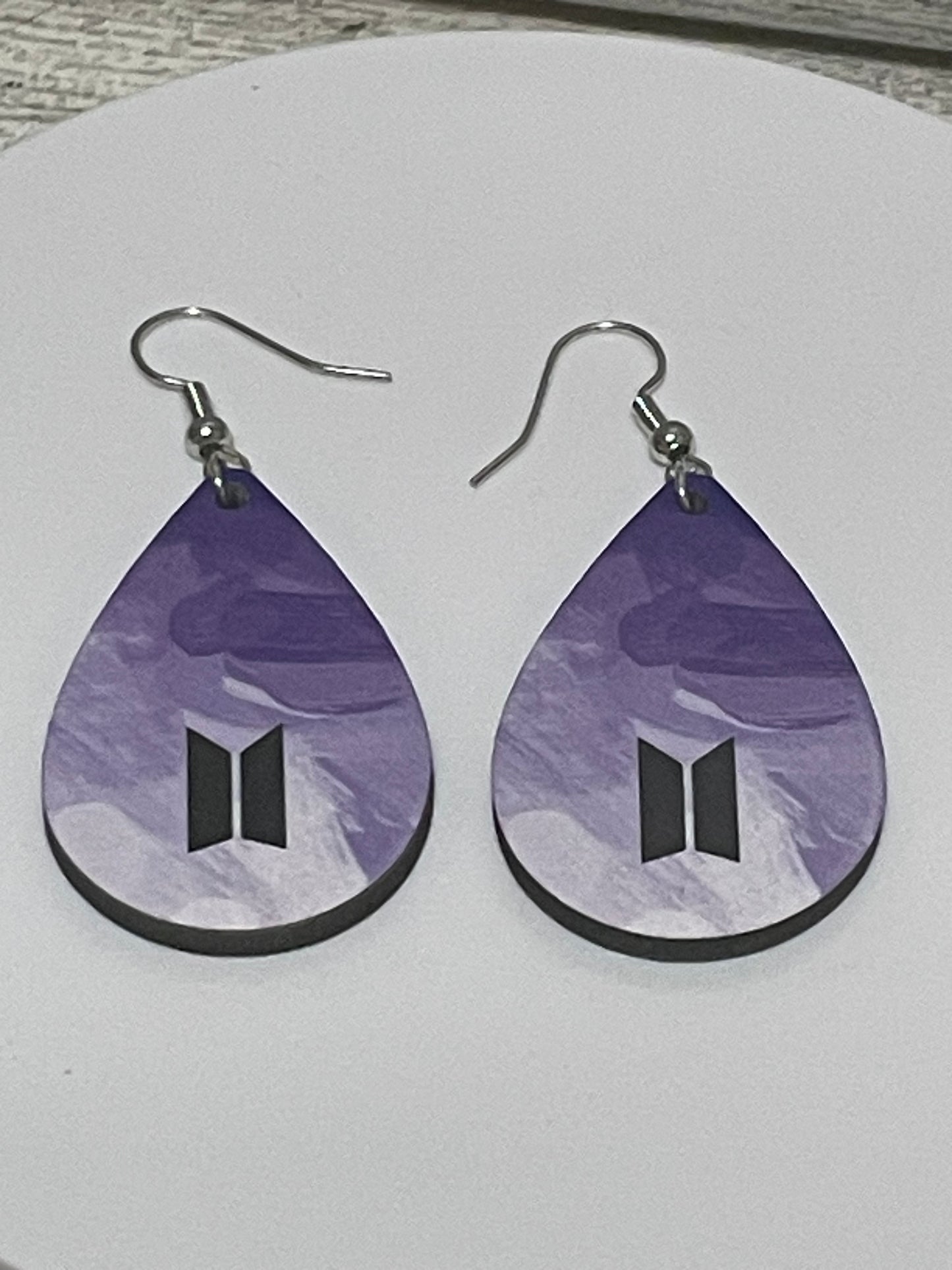 Shades of Purple logo earrings